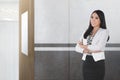 Pretty asian female teacher standing Royalty Free Stock Photo