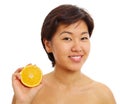 Pretty asian girl with half orange Royalty Free Stock Photo