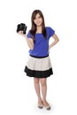 Pretty Asian girl standing with camera in her hand Royalty Free Stock Photo