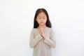 Pretty Asian little child hands praying gesture on white isolated background. Spirituality and religion faith hope concept Royalty Free Stock Photo