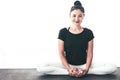 Pretty Asian middle-ages women are practicing yoga in the basic position On a white background