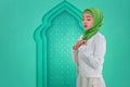 Pretty asian muslim woman with traditional dress praying Royalty Free Stock Photo