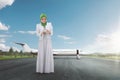 Pretty asian muslim woman using mobile phone Royalty Free Stock Photo