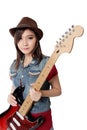 Pretty Asian rocker girl posing with her guitar, on white background Royalty Free Stock Photo