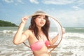 Pretty Asian woman joyfully with fishing scoop net . Royalty Free Stock Photo