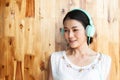 Pretty woman listening and enjoying music. Beauty and Healthy concept Royalty Free Stock Photo