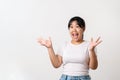 The pretty Asian young woman with surprise and shocked facial expression standing on a white background Royalty Free Stock Photo