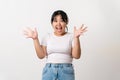 The pretty Asian young woman with surprise and shocked facial expression standing on a white background Royalty Free Stock Photo