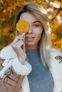 Pretty attractive girl with blue eyes in seasonal clothes Royalty Free Stock Photo