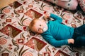 Pretty Baby Boy With Soother Lying On Sofa Royalty Free Stock Photo