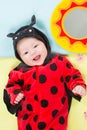 Pretty baby girl, dressed in ladybug costume Royalty Free Stock Photo