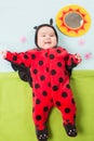 Pretty baby girl, dressed in ladybug costume Royalty Free Stock Photo