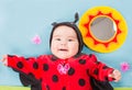 Pretty baby girl, dressed in ladybug costume Royalty Free Stock Photo