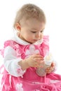 Pretty baby girl is drinking milk Royalty Free Stock Photo