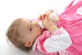 Pretty baby girl is drinking milk Royalty Free Stock Photo