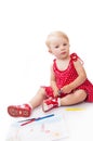 Pretty baby girl with pencils and album