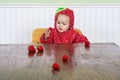 Pretty baby in strawberry suit