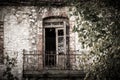 Pretty balcony in abandoned building in Greece.