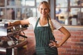 Pretty barista looking at the camera