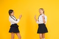 Pretty beauties. small girls in school uniform. back to school. educational blog. new technology. online education Royalty Free Stock Photo