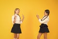 Pretty beauties. small girls in school uniform. back to school. educational blog. new technology. online education Royalty Free Stock Photo