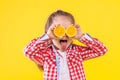 Colorful casual child girl isolated on yellow background Royalty Free Stock Photo