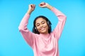 Pretty black girl dancing listening music with her headphones Royalty Free Stock Photo