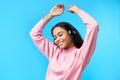Pretty black girl dancing listening music with her headphones Royalty Free Stock Photo