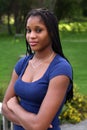 Pretty black teenage girl in a green park Royalty Free Stock Photo