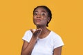 Pretty Black Woman Blowing A Kiss Posing On Yellow Background Royalty Free Stock Photo