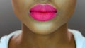 Pretty black woman, pink matte lipstick Royalty Free Stock Photo