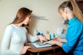 Pretty blond Doctor advises her patient Royalty Free Stock Photo