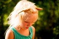 Pretty blond toddler girl making bubbles on a sunny summer day Royalty Free Stock Photo