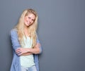 Pretty blond woman smiling with arms crossed Royalty Free Stock Photo