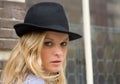 Pretty blonde in a black hat Royalty Free Stock Photo