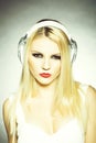 Pretty blonde dg girl in headset with red lips Royalty Free Stock Photo