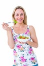 Pretty blonde eating bowl of salad Royalty Free Stock Photo