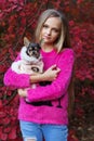 Pretty blonde girl with chihuahua on the nature Royalty Free Stock Photo