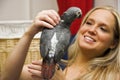 Woman and Her Pet African Grey Parrot Royalty Free Stock Photo