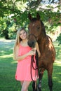 Pretty Blonde High School Senior Girl Outdoor with Horse Royalty Free Stock Photo