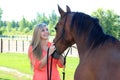 Pretty Blonde High School Senior Girl Outdoor with Horse Royalty Free Stock Photo