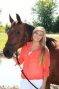 Pretty Blonde High School Senior Girl Outdoor with Horse Royalty Free Stock Photo