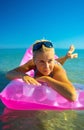 Pretty blonde on inflatable raft Royalty Free Stock Photo