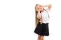 Pretty blonde schoolgirl isolated on a white background Royalty Free Stock Photo