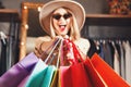 Pretty Blonde Shopaholic Holding Many Colorful Shopping Bags Royalty Free Stock Photo