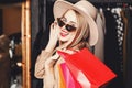 Pretty Blonde Shopaholic Smiling With Shopping Bags Royalty Free Stock Photo