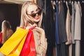 Pretty Blonde Shopaholic Smiling With Shopping Bags Royalty Free Stock Photo