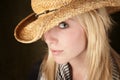 Pretty blonde teenager in a cowboy hat