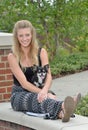 Pretty blonde woman with her pet Chihuahua Royalty Free Stock Photo