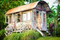 Pretty blonde woman and antique gypsy caravan 8